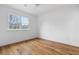 Bright bedroom with hardwood floors, fresh paint, crown molding, and a large window at 239 E Wesley Ne Rd, Atlanta, GA 30305