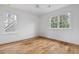 Bright bedroom with hardwood floors, fresh paint and a ceiling fan at 239 E Wesley Ne Rd, Atlanta, GA 30305