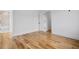 Spacious bedroom with hardwood floors, freshly painted walls, and access to a bathroom at 239 E Wesley Ne Rd, Atlanta, GA 30305