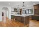 Bright kitchen with a large island, custom cabinets, stainless steel appliances, and hardwood floors at 239 E Wesley Ne Rd, Atlanta, GA 30305