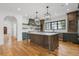 Spacious kitchen with a large center island, custom cabinets, and modern appliances at 239 E Wesley Ne Rd, Atlanta, GA 30305