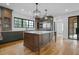 Well-appointed kitchen with stainless steel appliances, a large island, and custom cabinets, offering both style and functionality at 239 E Wesley Ne Rd, Atlanta, GA 30305