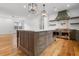 Beautiful kitchen featuring a large island, custom cabinetry, and professional-grade appliances, perfect for cooking enthusiasts at 239 E Wesley Ne Rd, Atlanta, GA 30305