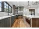 Bright eat-in kitchen with stainless steel appliances, light countertops, hardwood floors and dark gray cabinetry at 239 E Wesley Ne Rd, Atlanta, GA 30305
