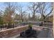 Cozy outdoor patio with brick surround, perfect for enjoying peaceful moments at 239 E Wesley Ne Rd, Atlanta, GA 30305
