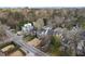 Picturesque street view of homes with manicured lawns and mature trees at 239 E Wesley Ne Rd, Atlanta, GA 30305