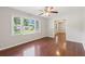 A living room with large windows that provide bright, natural light and hardwood floors at 1231 Sanden Ferry Dr, Decatur, GA 30033