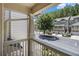 View from balcony of townhome complex with mature shade trees and well-maintained landscaping at 1537 Liberty Nw Pkwy, Atlanta, GA 30318