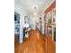 Hallway with a wood door, hardwood floors and decorative lighting at 2982 N Main Nw St, Kennesaw, GA 30144