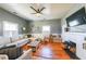 Cozy living room featuring hardwood floors, a fireplace and a comfortable seating area at 2982 N Main Nw St, Kennesaw, GA 30144