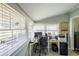 Bright home office with lots of natural light, a desk with computer, and built-in shelves at 2982 N Main Nw St, Kennesaw, GA 30144