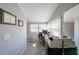 Home office with desk, printer, neutral paint, and lots of natural light from the bright windows at 2982 N Main Nw St, Kennesaw, GA 30144