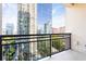Enjoy skyline views from the private balcony with black metal railing, offering an outdoor living space at 3445 Stratford Ne Rd # 1605, Atlanta, GA 30326