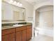 Well lit bathroom with a large vanity, granite countertop, and shower-tub combination at 3445 Stratford Ne Rd # 1605, Atlanta, GA 30326