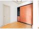Compact bedroom featuring a murphy bed and built-in storage at 3445 Stratford Ne Rd # 1605, Atlanta, GA 30326