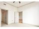 Bright bedroom features neutral tones, ceiling fan, and access to the home's other rooms at 3445 Stratford Ne Rd # 1605, Atlanta, GA 30326