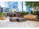 Paramount residences featuring an outdoor lounge area with a waterfall and modern outdoor seating at 3445 Stratford Ne Rd # 1605, Atlanta, GA 30326