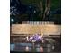 Relaxing fire pit and sitting area with decorative rock facade at 3445 Stratford Ne Rd # 1605, Atlanta, GA 30326