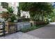 Well-maintained building exterior showcasing manicured landscaping and clear signage for The Paramount at 3445 Stratford Ne Rd # 1605, Atlanta, GA 30326