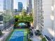 The Paramount's luxurious amenities include an outdoor tennis court, swimming pool, and elegant lounge areas at 3445 Stratford Ne Rd # 1605, Atlanta, GA 30326