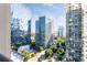 Breathtaking city views from the balcony, surrounded by towering skyscrapers and greenery at 3445 Stratford Ne Rd # 1605, Atlanta, GA 30326