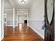 Inviting foyer featuring gleaming hardwood floors and neutral paint at 2984 Berry Rd, Loganville, GA 30052