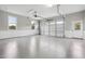 Spacious two-car garage featuring epoxy floors and ample natural light, perfect for vehicles and storage at 2984 Berry Rd, Loganville, GA 30052