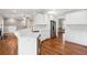 The kitchen has quartz countertops, stainless steel appliances, and hardwood floors at 2984 Berry Rd, Loganville, GA 30052