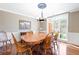 Elegant dining room featuring hardwood flooring, natural light, and traditional details at 330 Todwick Dr, Roswell, GA 30075