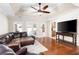 Comfortable living room featuring hardwood floors and backyard access at 330 Todwick Dr, Roswell, GA 30075