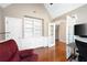 Bright office featuring hardwood flooring and built-in bookcase at 330 Todwick Dr, Roswell, GA 30075