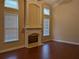 A spacious living room features a fireplace and large windows at 735 Briarhurst Ct, Lawrenceville, GA 30046