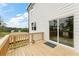 New deck with great view of the backyard, with sliding door access to the home's interior at 8523 Poston Place Lot 132, Douglasville, GA 30134