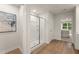 Modern bathroom with a glass-enclosed shower and wood-style flooring at 8523 Poston Place Lot 132, Douglasville, GA 30134