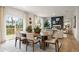 Spacious dining area with sliding doors to the deck and views of the backyard at 8523 Poston Place Lot 132, Douglasville, GA 30134