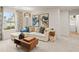 Comfortable living room with a sectional couch and a modern coffee table at 8523 Poston Place Lot 132, Douglasville, GA 30134
