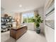 Inviting home office featuring a modern desk, shelving, and ample natural light at 8523 Poston Place Lot 132, Douglasville, GA 30134