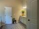 Well-lit bathroom featuring a modern vanity, stylish mirror, and elegant decorative accents at 3624 Peeksville Rd, Locust Grove, GA 30248