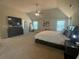 Spacious main bedroom features a large bed, dresser, and plenty of open space at 3624 Peeksville Rd, Locust Grove, GA 30248