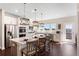 Island kitchen with stainless appliances, white subway tile backsplash, and hardwood flooring at 800 Mackay Crk, Woodstock, GA 30188