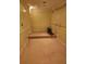 Unfinished basement with tile floors, recessed lighting, and trim molding at 9936 Point Vw, Jonesboro, GA 30238
