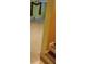 Image shows a partially finished basement with tiled flooring and a staircase at 9936 Point Vw, Jonesboro, GA 30238
