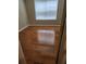 Bedroom featuring hardwood floors and a window with blinds at 9936 Point Vw, Jonesboro, GA 30238
