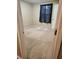 An empty bedroom with carpet and a dark curtain at 9936 Point Vw, Jonesboro, GA 30238