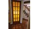 Foyer with hardwood floors, stairs, and a doorway at 9936 Point Vw, Jonesboro, GA 30238
