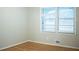 Bedroom featuring a window for natural light and hardwood floors at 6470 Sherwood Trl, Austell, GA 30168