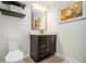 Stylish bathroom features a modern vanity, framed mirror and decorative tile flooring at 8 Alston Ne Pl, Atlanta, GA 30324