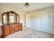 Bedroom with large dresser and view to an outdoor wooded area at 26 Loyd Cemetery Rd, Newborn, GA 30056