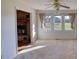 Bright living area with a brick fireplace visible from the next room at 26 Loyd Cemetery Rd, Newborn, GA 30056