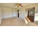 Open living space with multiple doorways and neutral carpet at 26 Loyd Cemetery Rd, Newborn, GA 30056